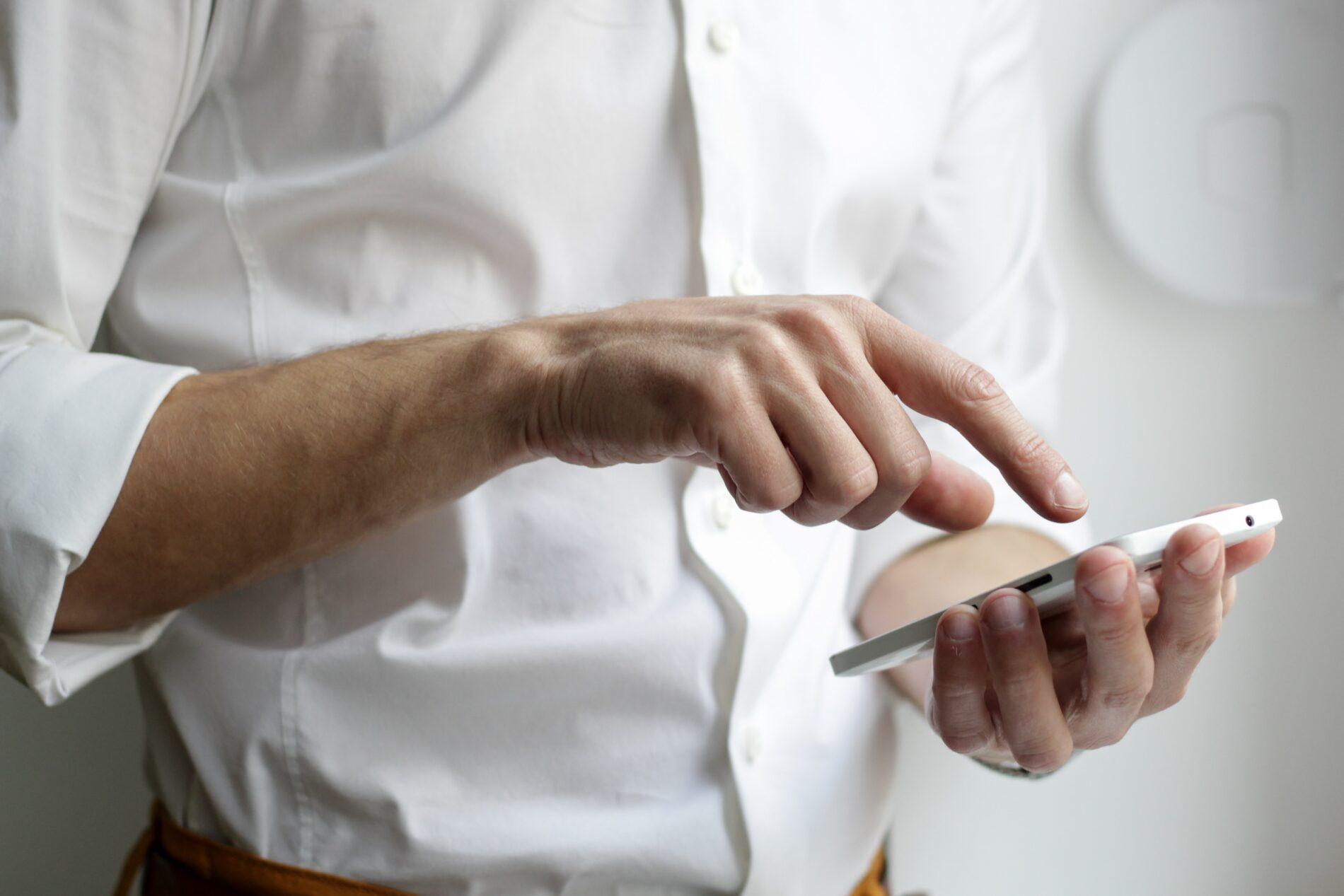 A man is testing a banking mobile app