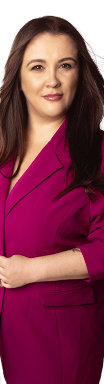 A woman in a burgundy jacket