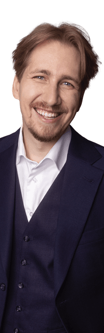 A smiling man in a suit