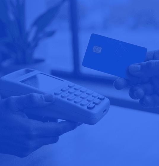 A person is paying by a Visa card