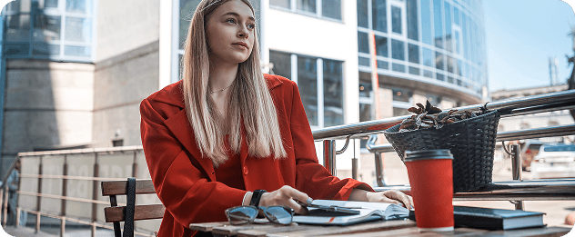 woman working from cafe in poland
