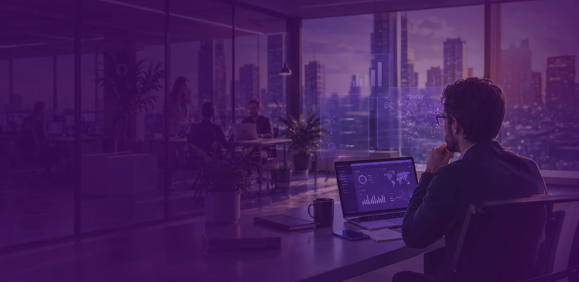 Fintech professional working with analytics dashboards in a sunset office